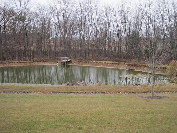 Pond is 14 feet deep and has been stocked.