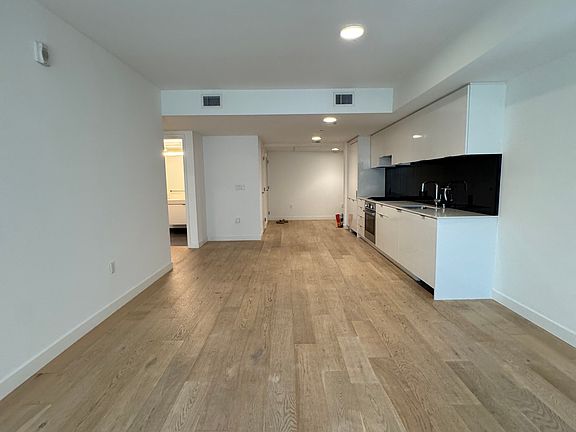 Living room with open kitchen