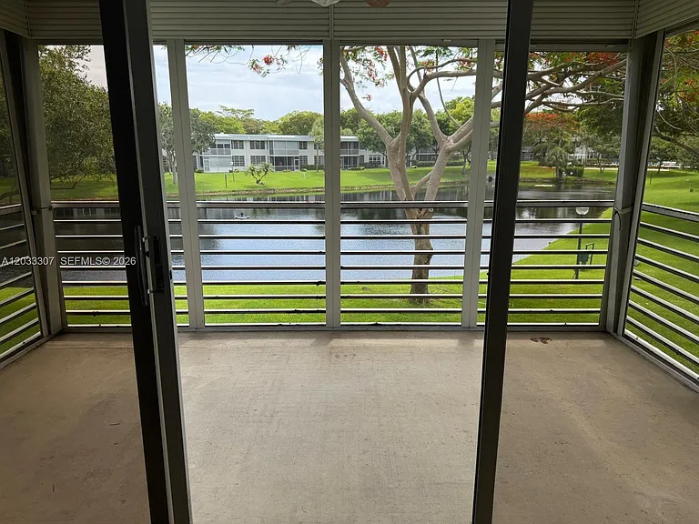 4261 W Palm Aire Dr #202 — Photo 18