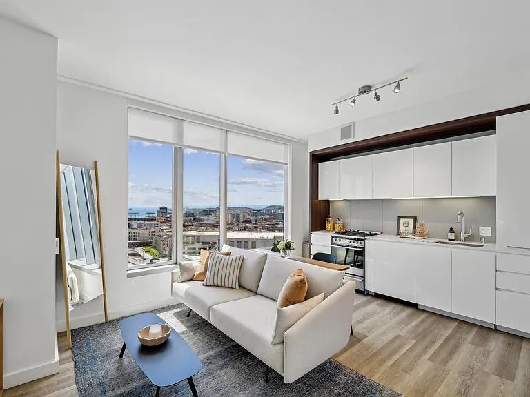 Bright and Open Living Room with Modern Kitchen