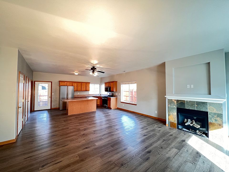 View from the front door of the living room and kitchen. Open floor plan.