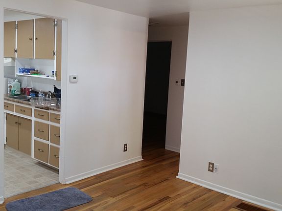 Hallway to 2 bedrooms and bathroom