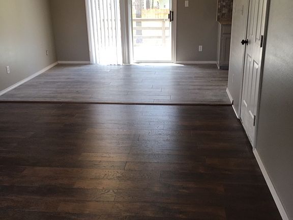 New wood plank tile in dining room in kitchen