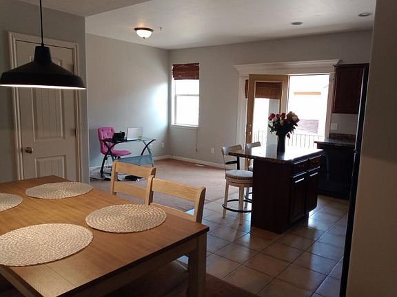 the kitchen is located right in front of the loft and on the side you have the dining room everything is open space.