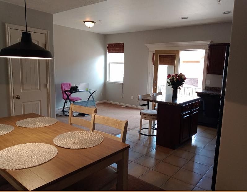 the kitchen is located right in front of the loft and on the side you have the dining room everything is open space.