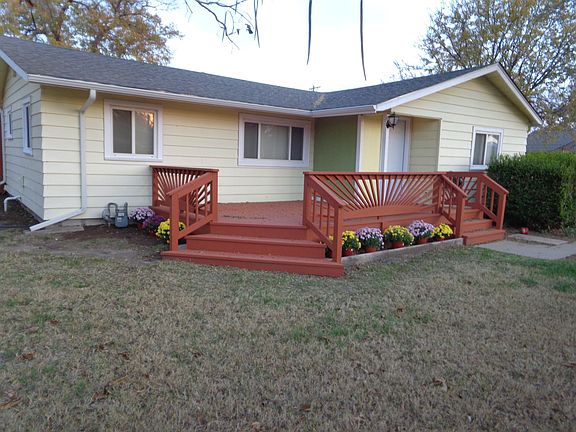front deck inside of cedar privacy fence
