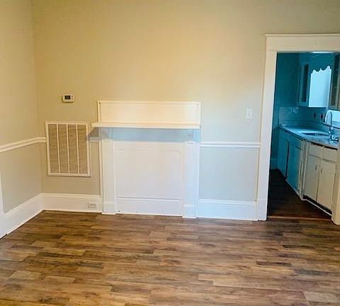 Dining room connecting to hallway (2 bedrooms + bath) - then - kitchen