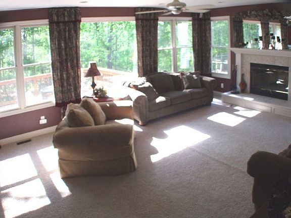 Great rm off of kitchen with many windows