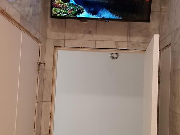 Bathroom Mounted TV, TV is larger than pic appears