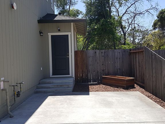 Tenant Parking Space, Front Door and Planter box