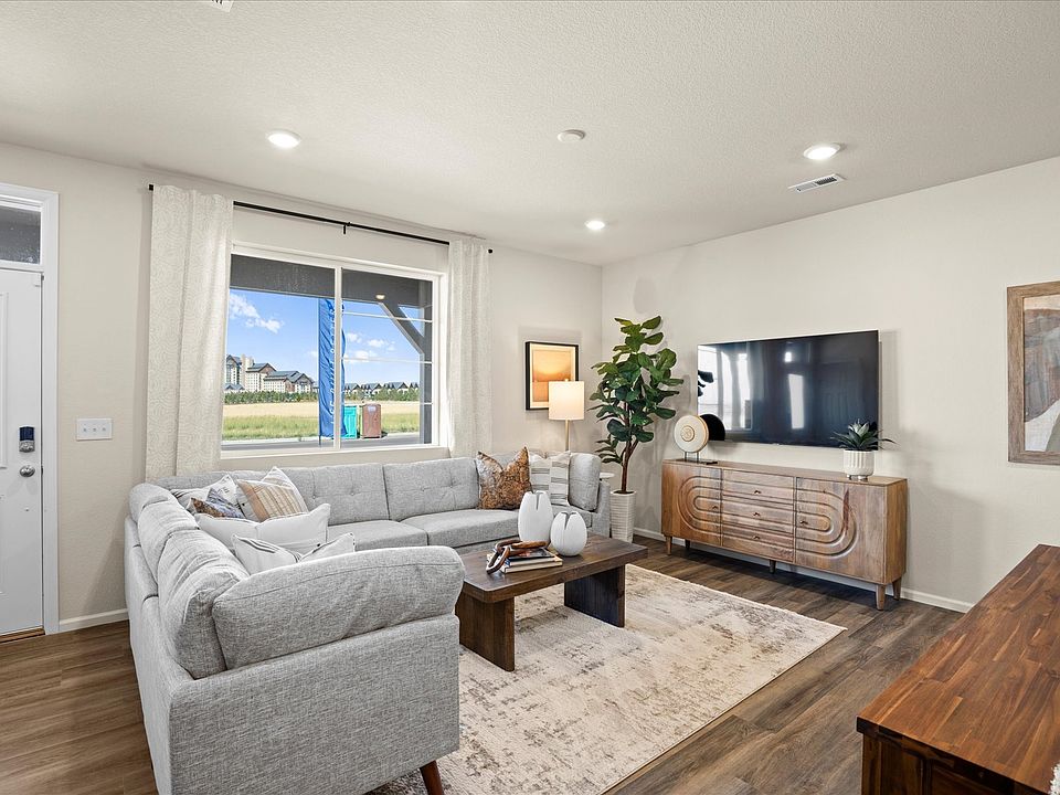Main Living Space - Model Home Picture (for representation of furniture layout only)