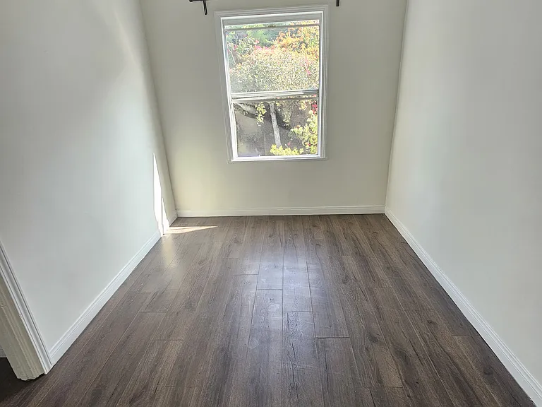 Bedroom, will fit Queen bed with space for two nightstands on either side and space for Full dresser with room to move around.