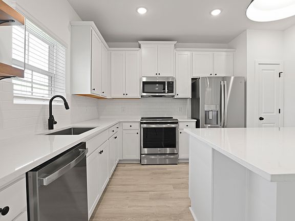Kitchen with stainless steel appliances