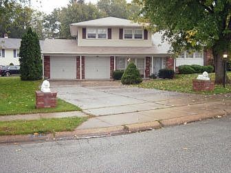 Holiday Split on corner lot with 2 car garage