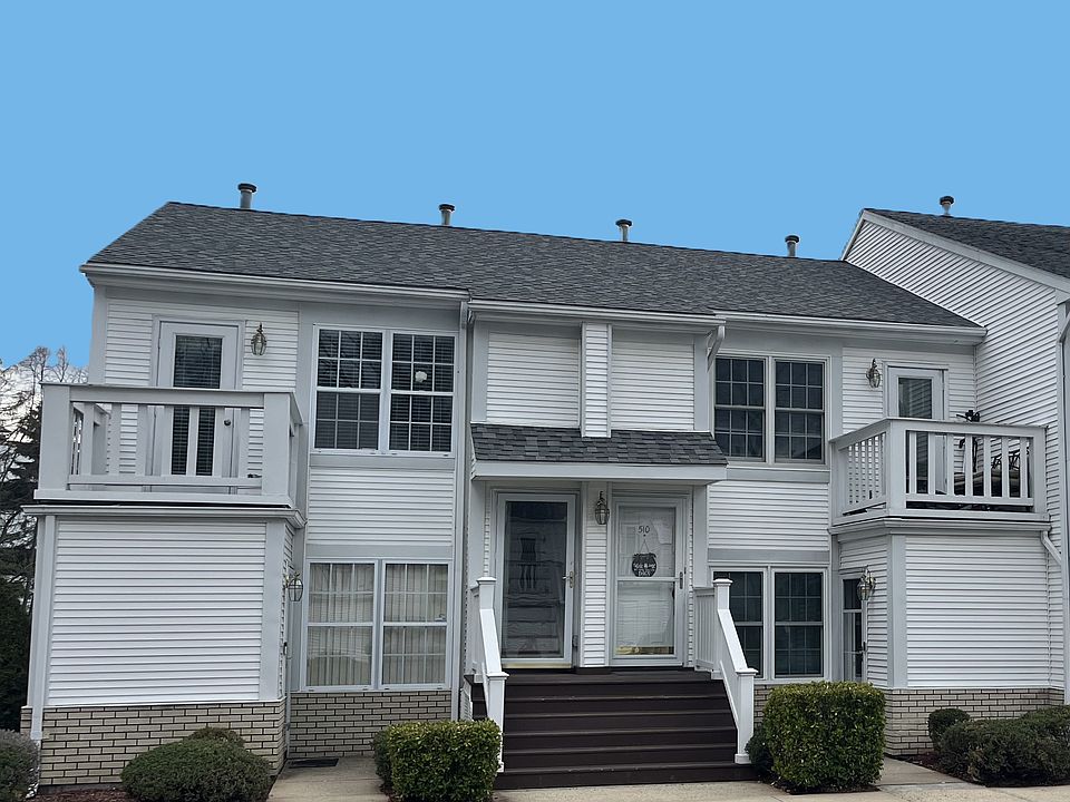 This rare one-bedroom condo lives like a private home, with its own entrance, no neighbors above, and dedicated parking right outside.