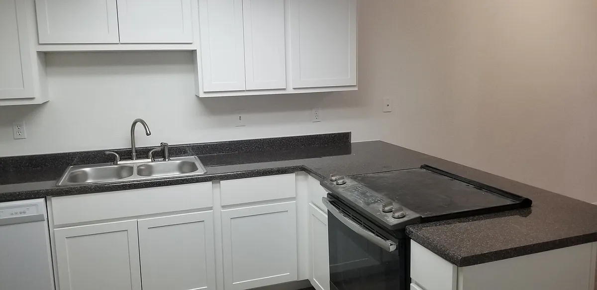 Building Photo - 3065 E Cicero St #102