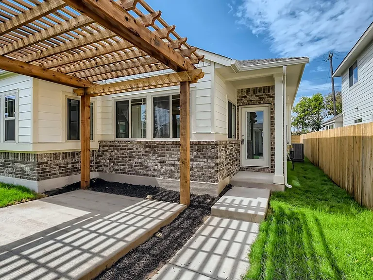 pergola in courtyard and front door