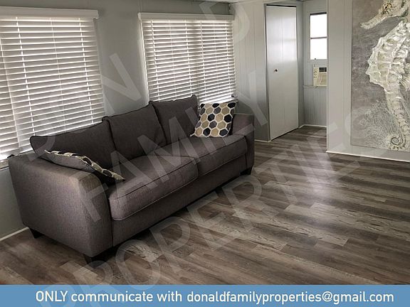 Florida room/Secondary bedroom. Has its own entrance door, closet, and half bathroom.