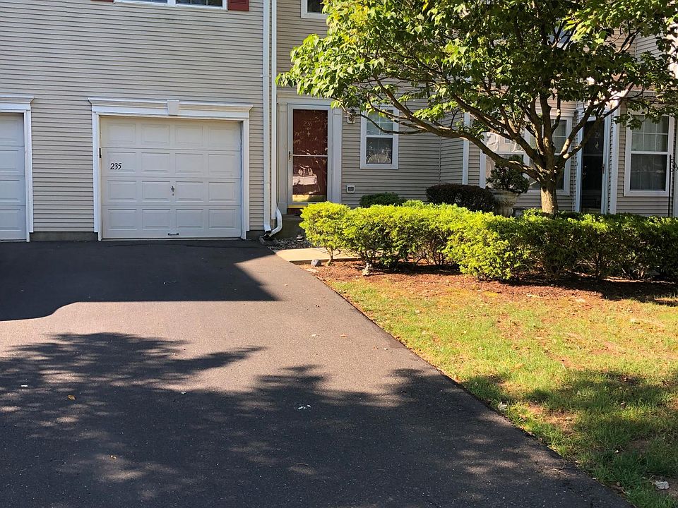 Frontal view (Garage and Driveway)