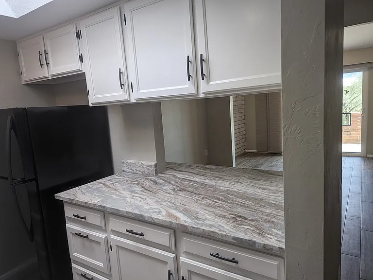 Kitchen with new granite counters, stainless sink and faucet