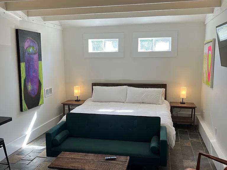 King-size bed. Linens are not provided.