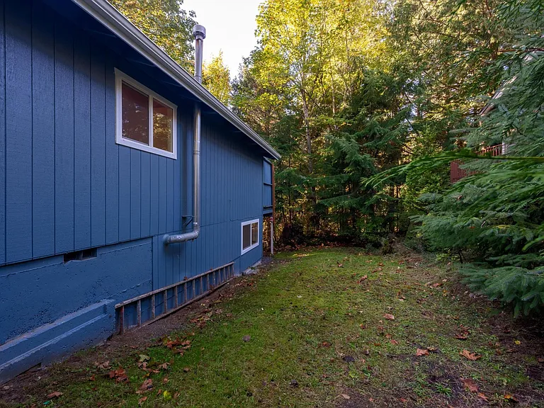 Side of home for storage / garden space