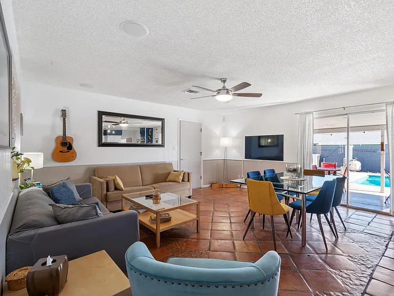 A warm and inviting living room, perfect for cozy nights or entertaining friends and family.