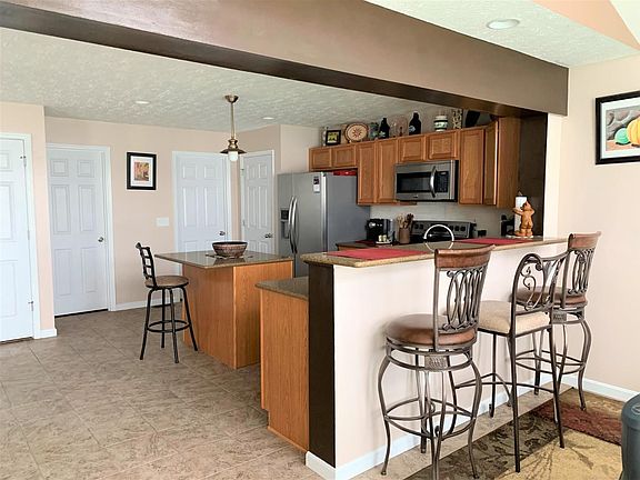View of the Kitchen Showing the Countertops and Bar area.
