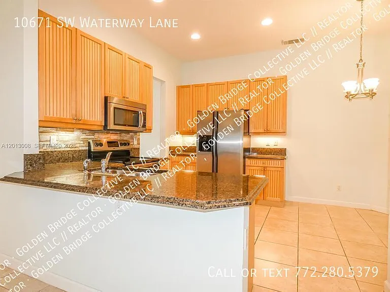 10671 SW Waterway Ln — Photo 1