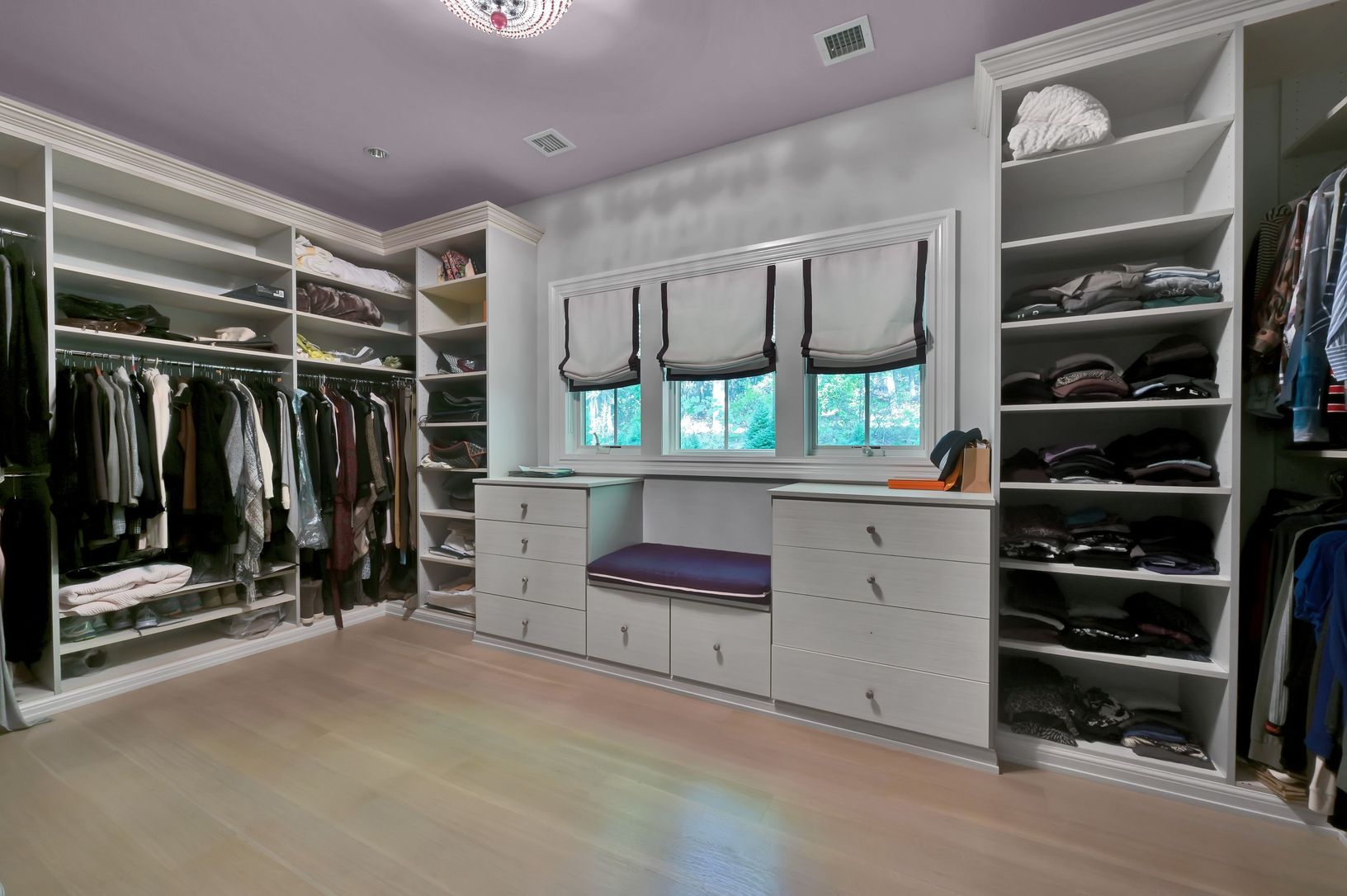  One of two primary bedroom closets