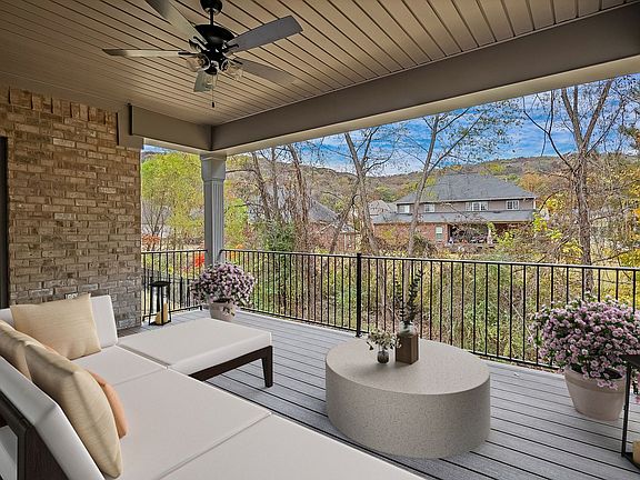 Gorgeous mountain views from the secluded back deck at 8117 Trail Meadows Drive.