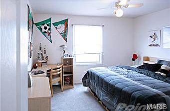 One of three upstairs bedrooms.