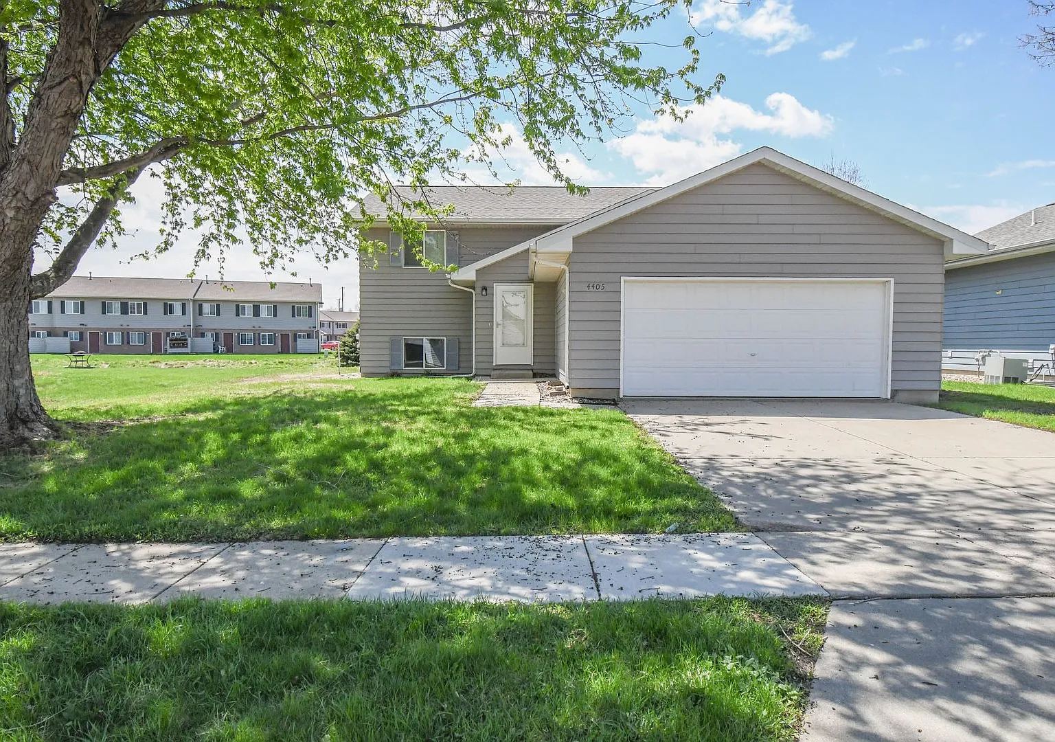 Updated 3BR Split-Level Home with Huge Deck, Fenced Yard & 2-Car Garage Near I-29! — Photo 1