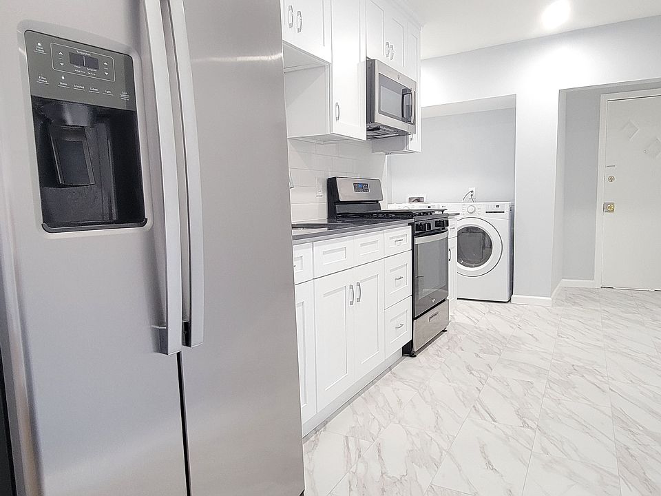 Modern kitchen featuring all new appliances