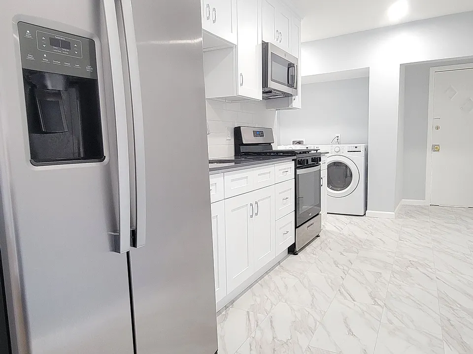 Modern kitchen featuring all new appliances