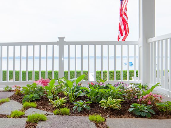 Two shade gardens on porch 