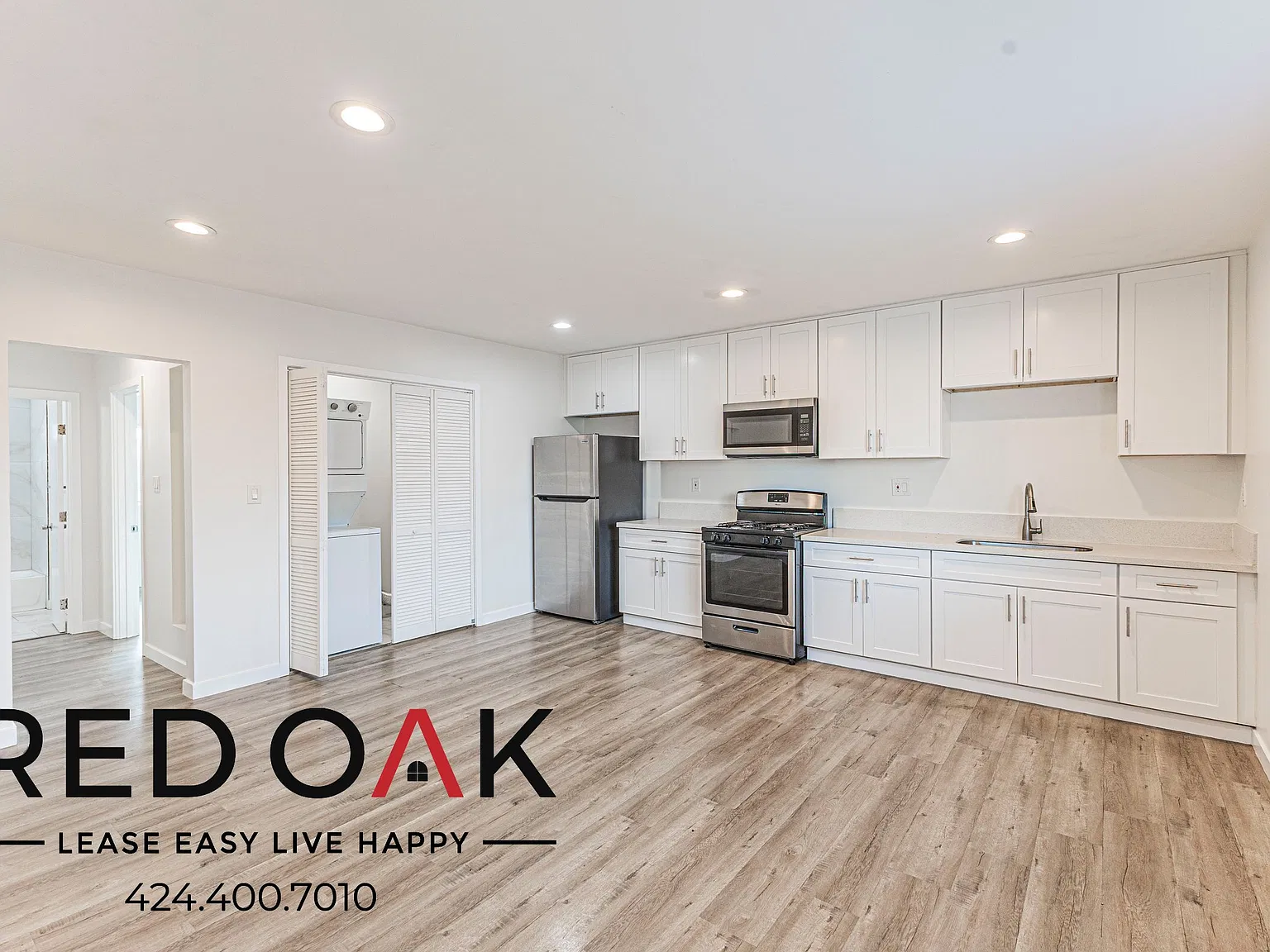 Open 3-Bed with Stainless Steel Appliances, Air Conditioning, In-Unit Laundry and Parking Availab... — Photo 4