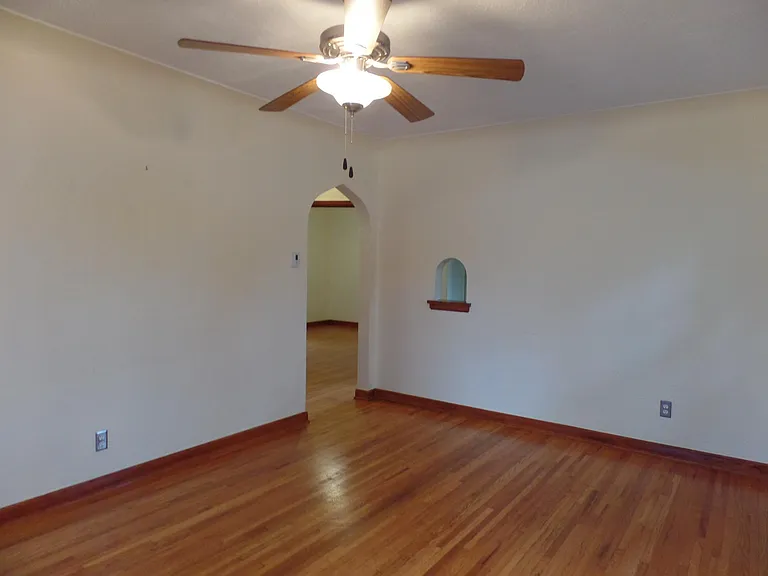 Living Room, leading into the Foyer.