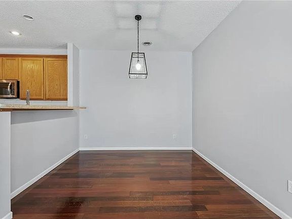 5th image of 9649 Queensland Ln N