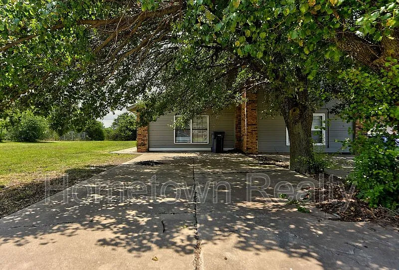 310 NW 118th St