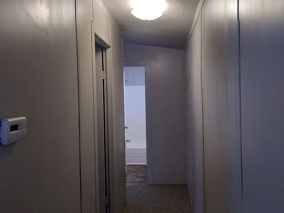Hallway to bedroom 2 &3 and 2nd full bathroom