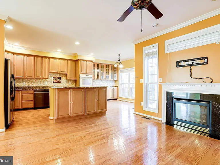 family room overlooking artistic kitchen