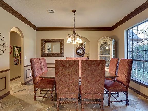 Light and bright formal dining with easy access to Wine room and kitchen.