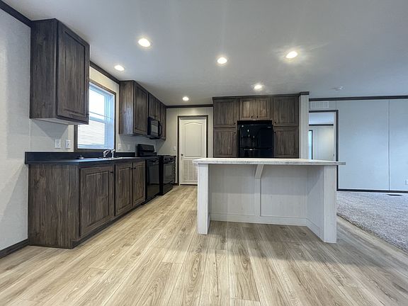 2nd image of 7204 E Grand River Ave Lot 463