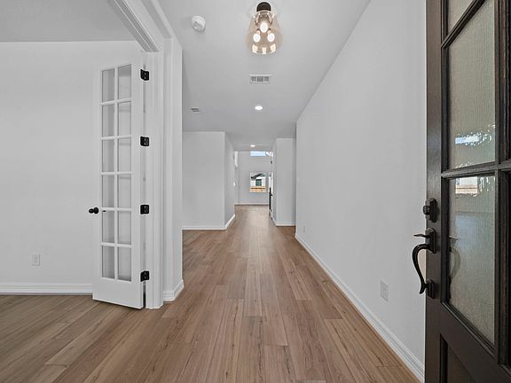 Welcome home! Step inside through the inviting entryway that seamlessly flows into the open-concept