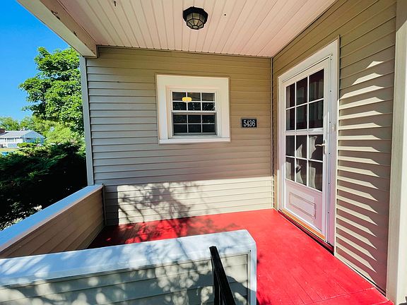Front porch with gathering space.