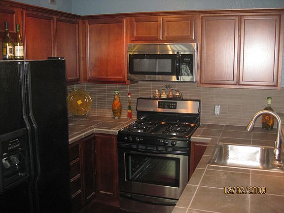 New cabinets, tile counters and full tile backsplash