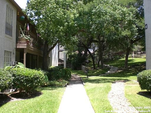 1st image of 8702 VILLAGE DR #106