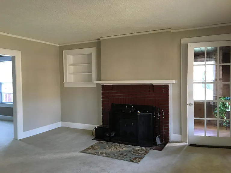 Working fireplace insert in living room.