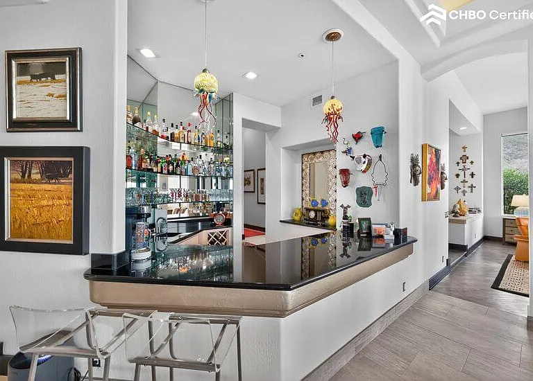 Fully stocked wet bar worthy of a resort lobby